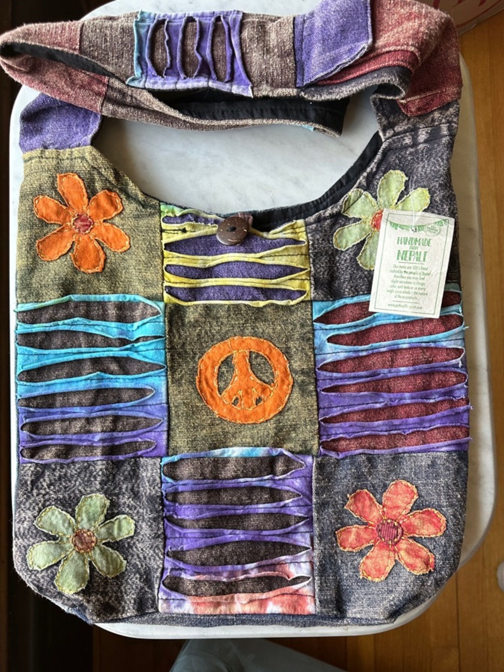 NWT Boho Patchwork Crossbody Bag with Orange Peace Motif